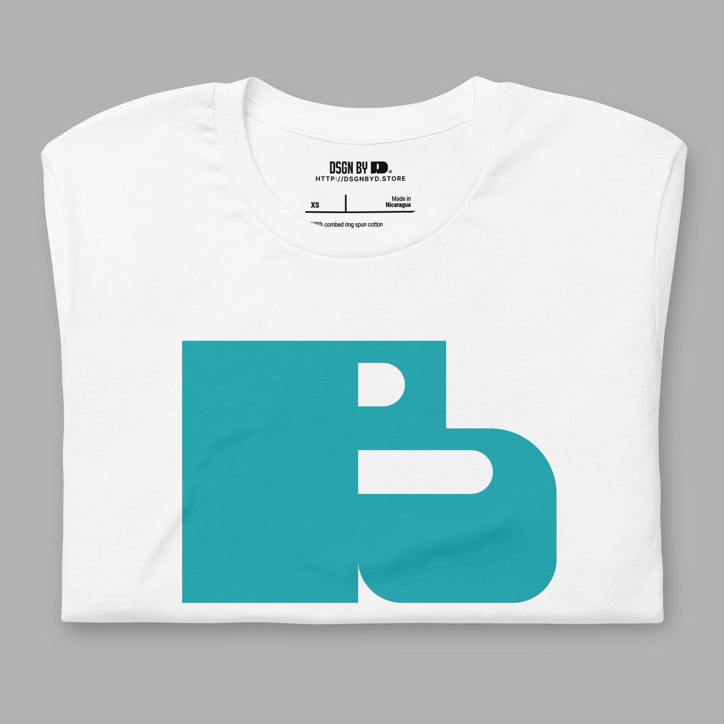 A folded white cotton unisex graphic tee with letter B.