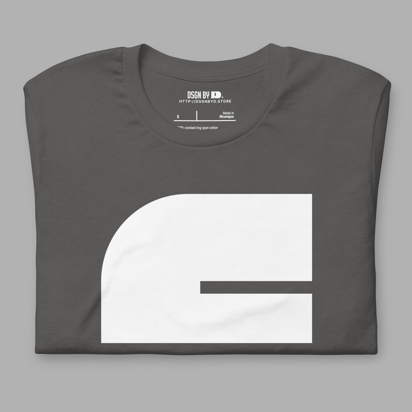 A folded grey cotton unisex graphic tee with letter C.