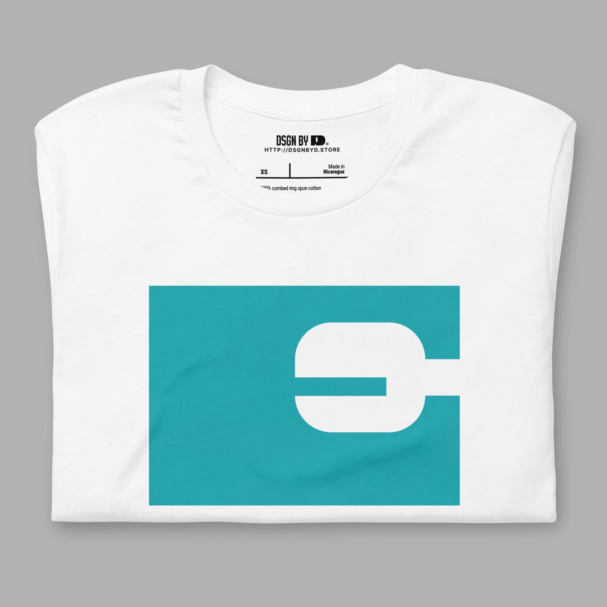 A folded white cotton unisex graphic tee with letter E.