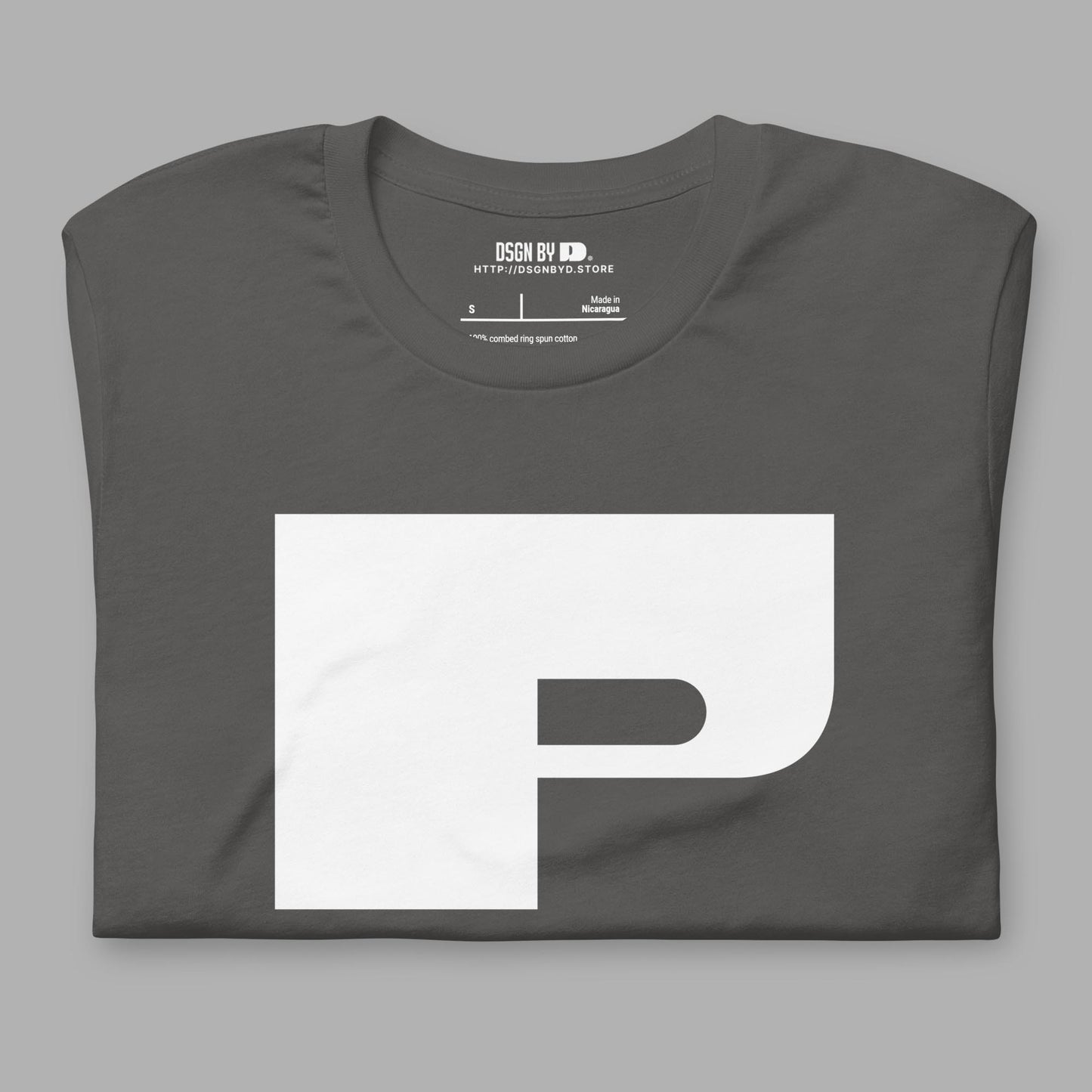 A folded grey cotton unisex graphic tee with letter P.