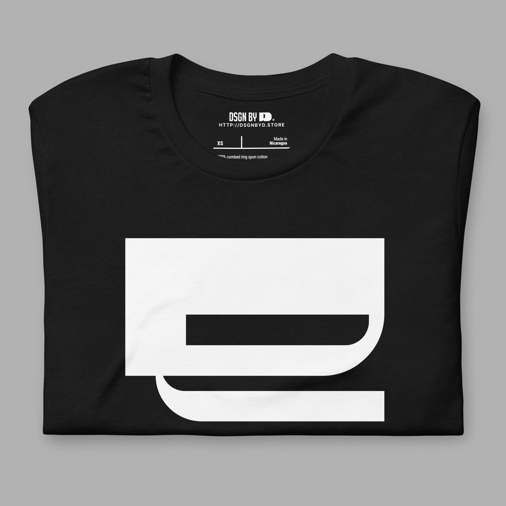 A folded black cotton unisex graphic tee with letter Q.