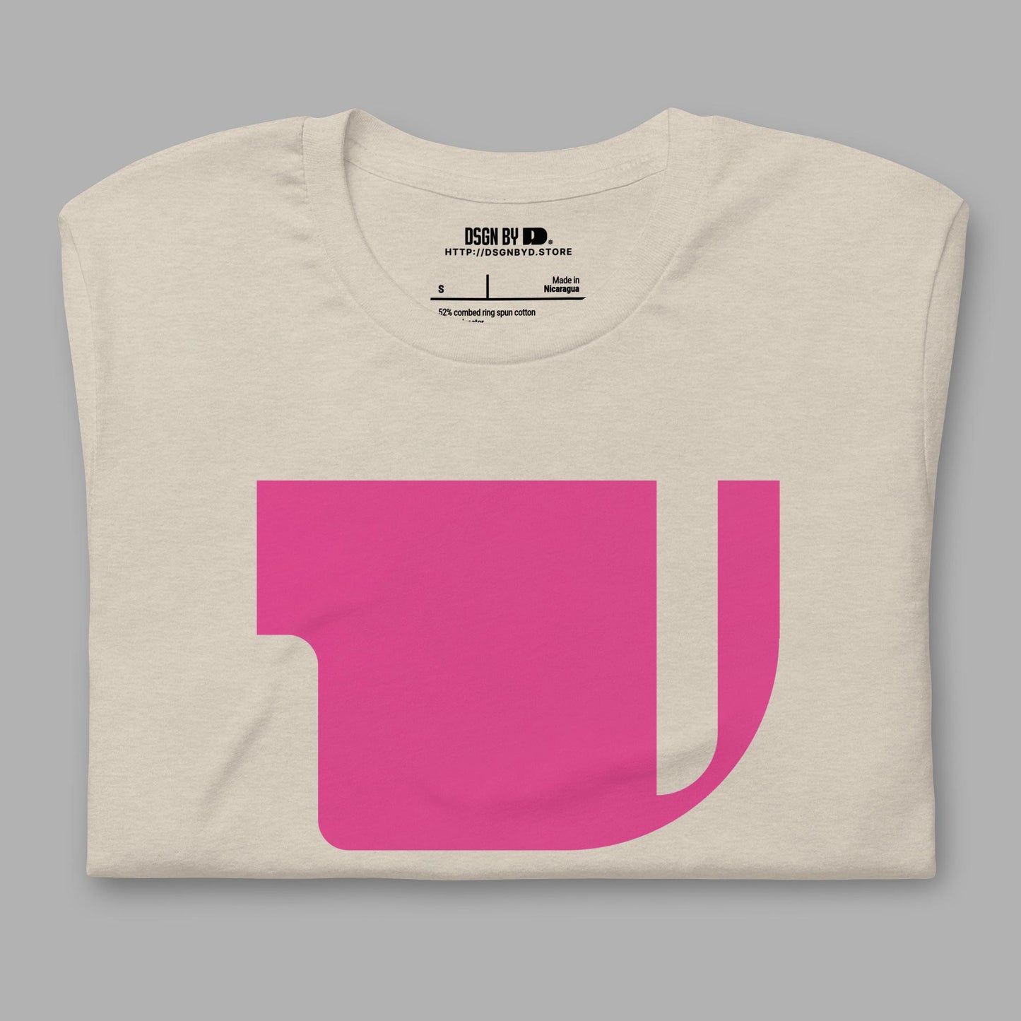 A folded beige cotton unisex graphic tee with letter V.
