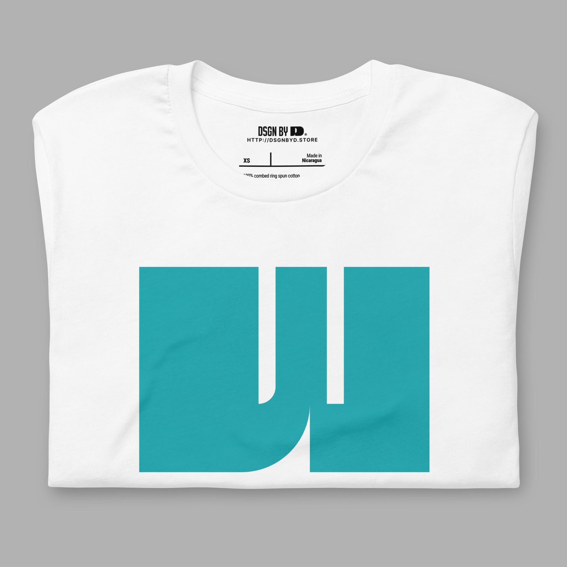 A folded white cotton unisex graphic tee with letter W.