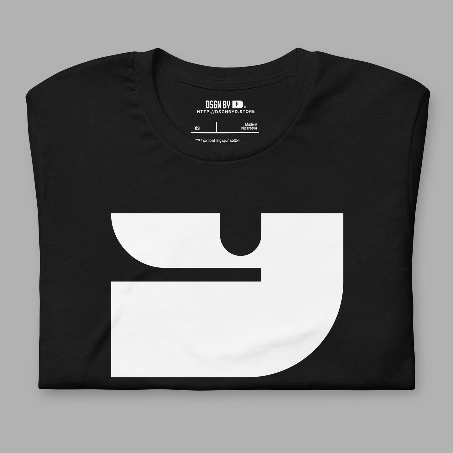 A folded black cotton unisex graphic tee with letter Y.